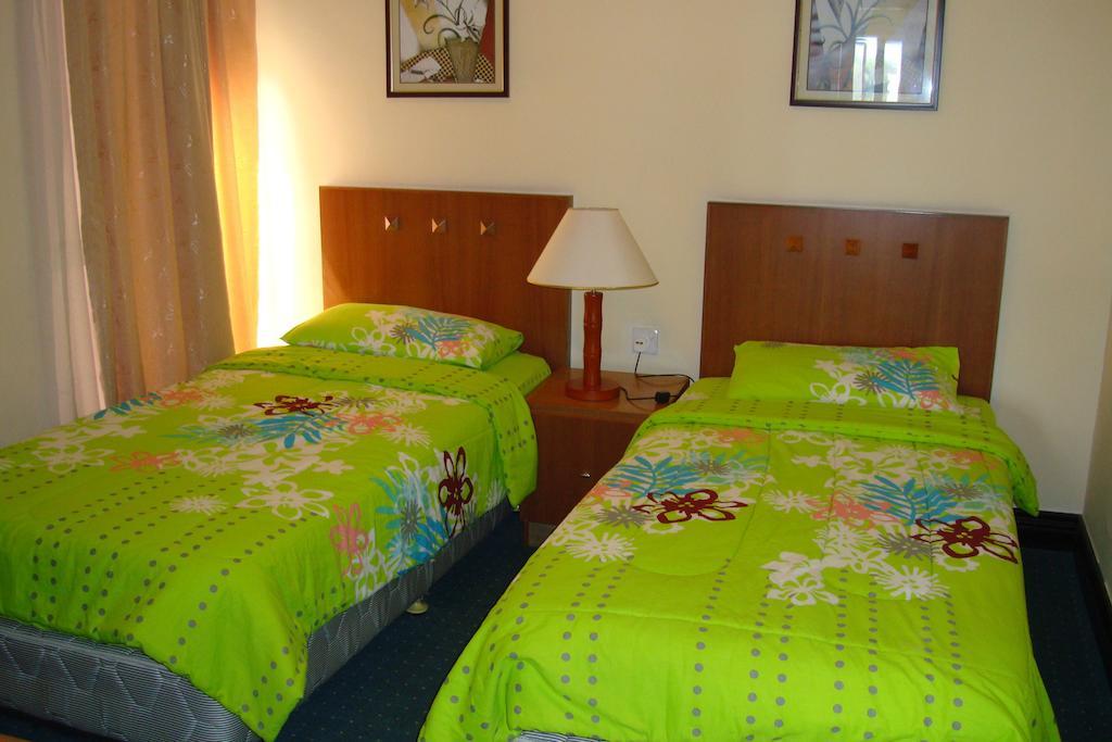Dorcas Service Apartment - Marina Court Kota Kinabalu Rum bild